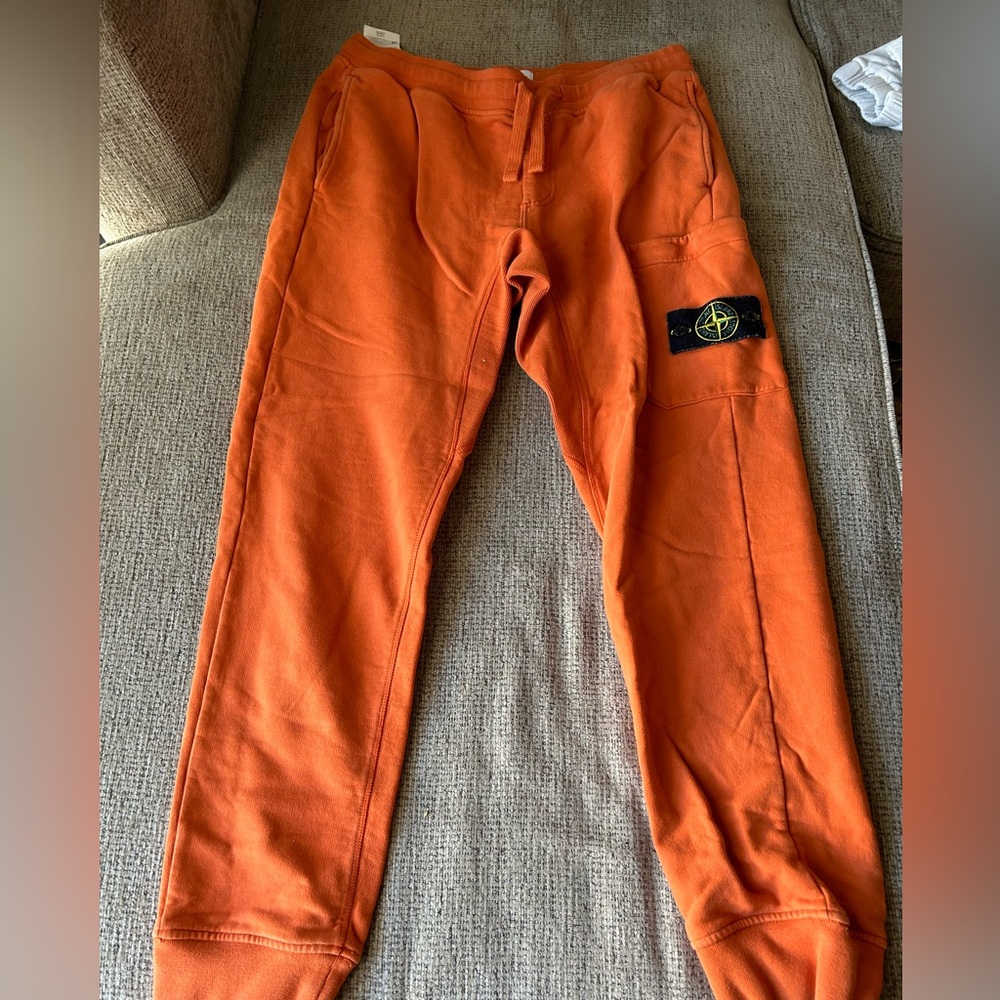 Orange stone island joggers size M